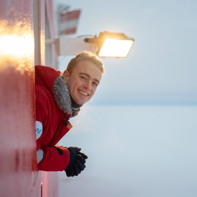 Picture of Sam Cornish looking out over sea ice from research vessel Akademik Fedorov